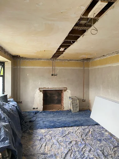 Living room strip out ceiling fireplace