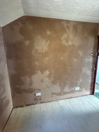 Freshly skimmed bedroom wall