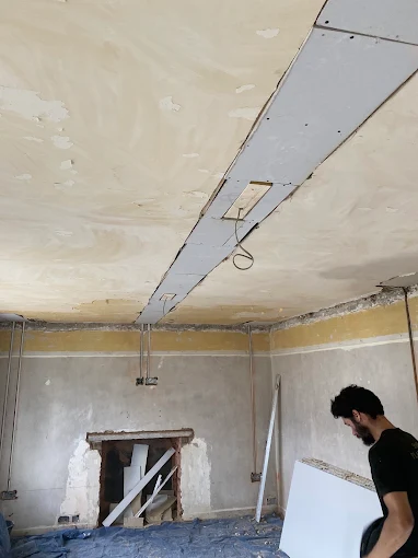 Ceiling repair in progress period room