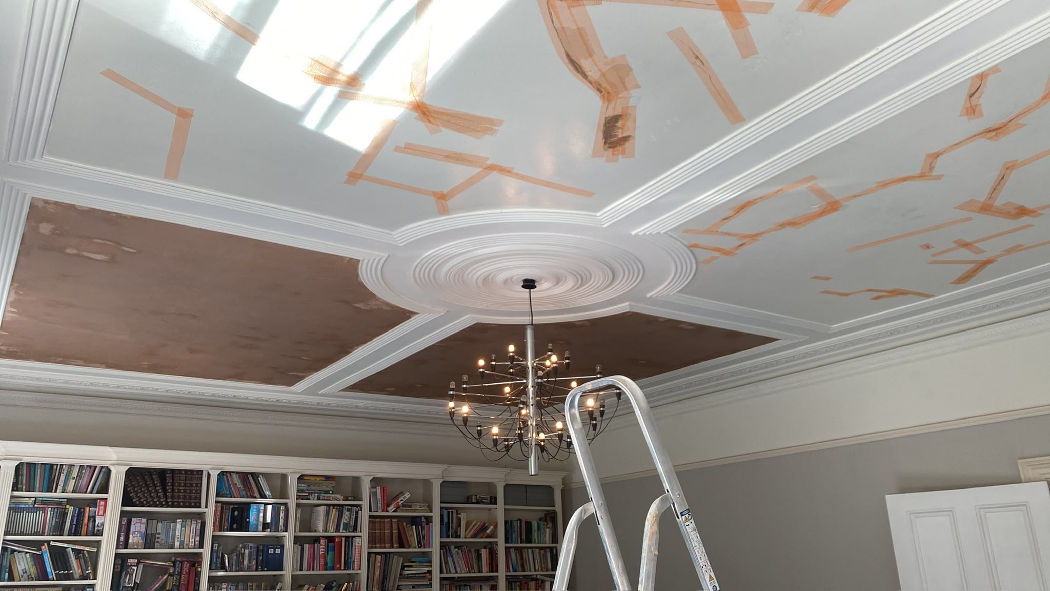 Decorative ceiling panels and rose repaired, during