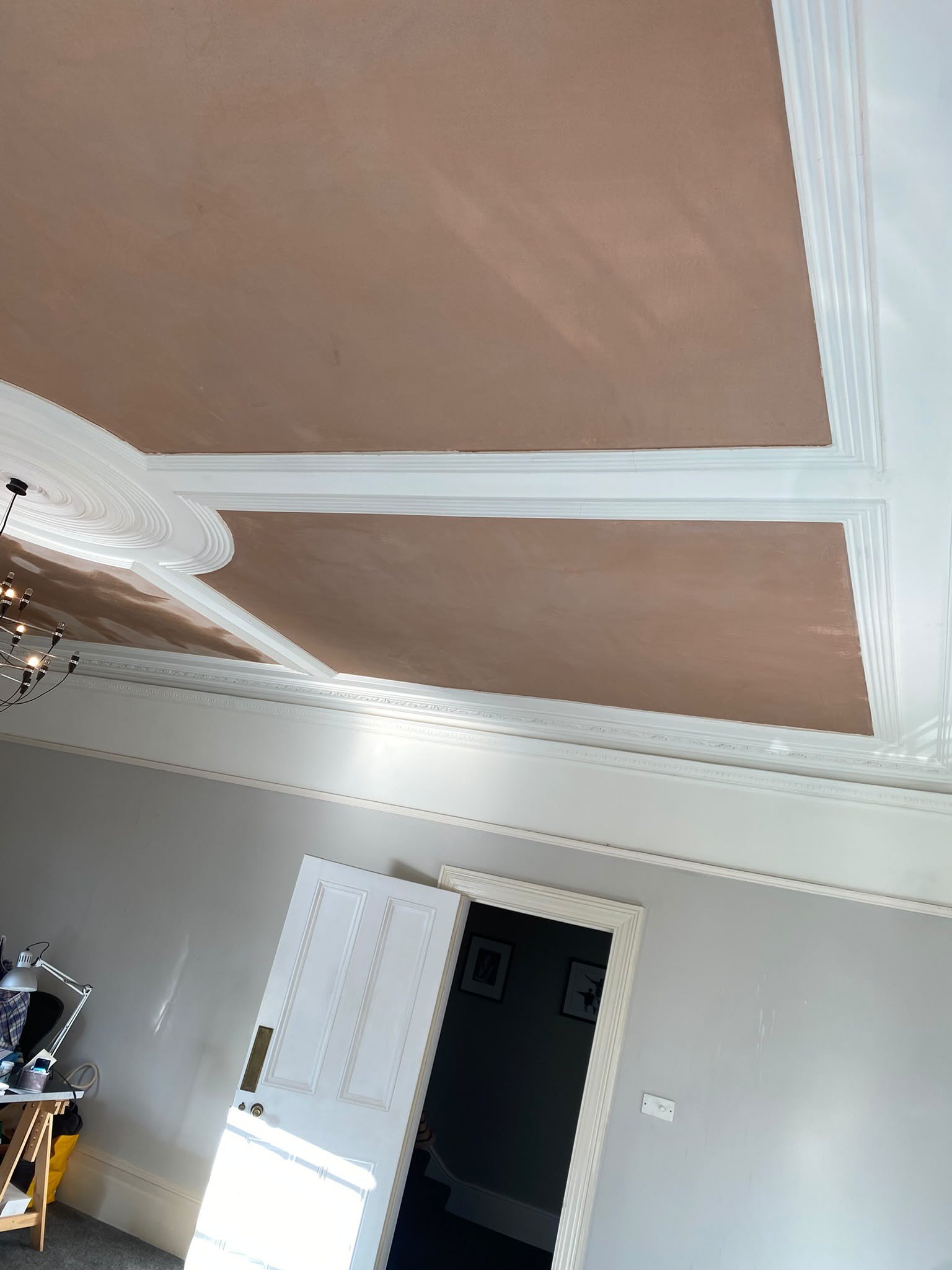 Decorative ceiling skimmed to cornice and door, after