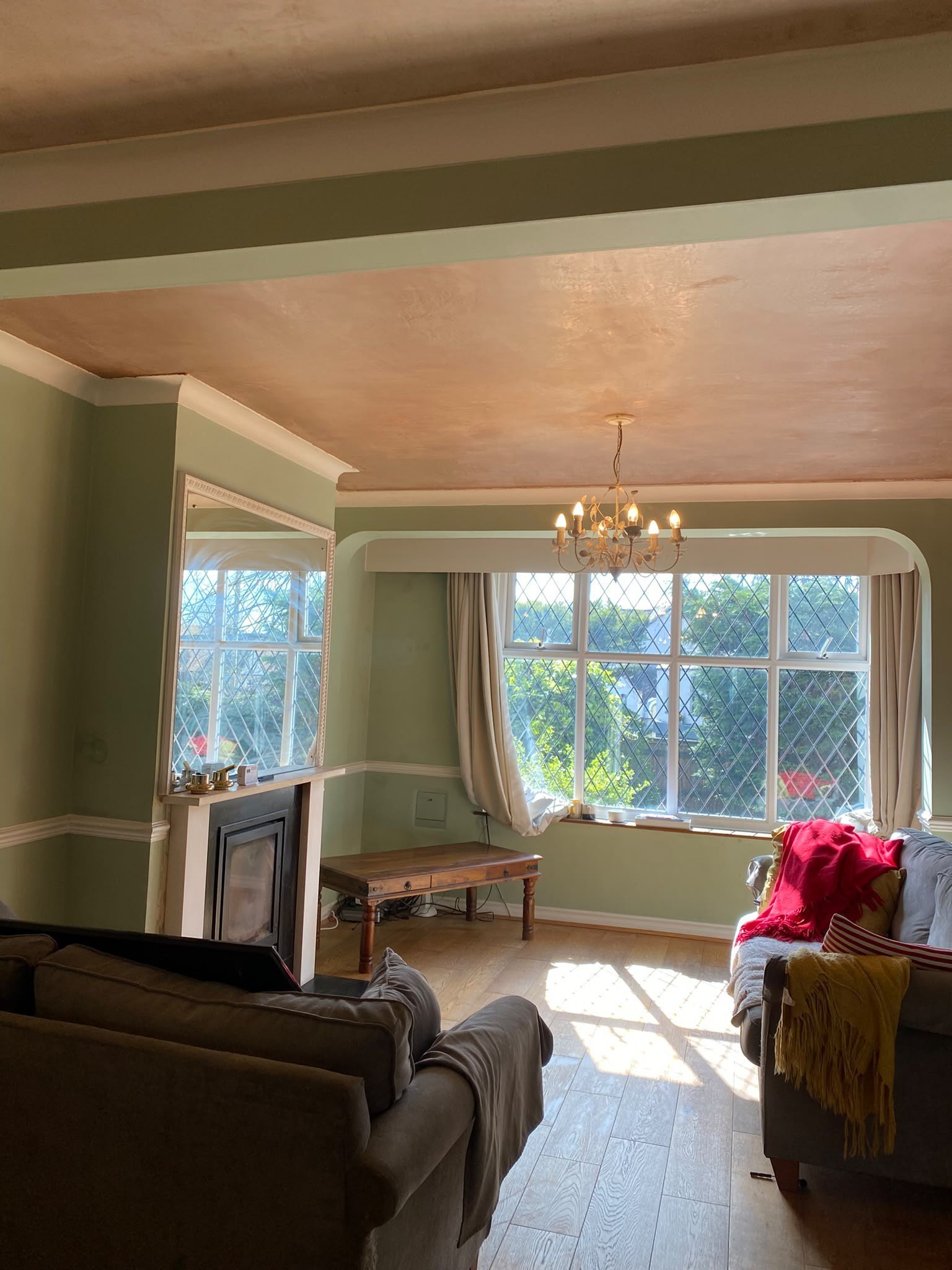 Living room finished and decorated bay window, after