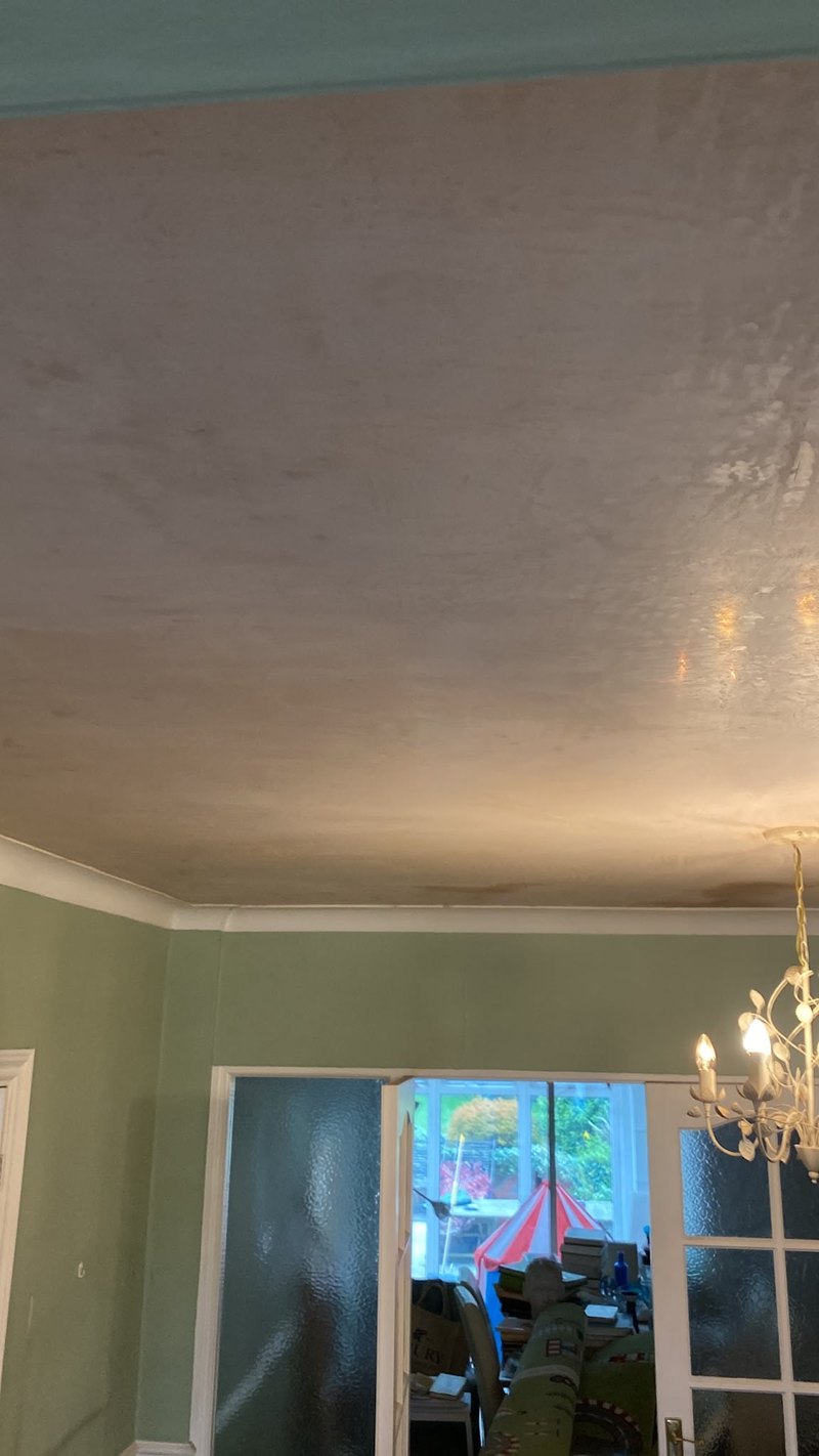 Ceiling finished above decorated walls, after