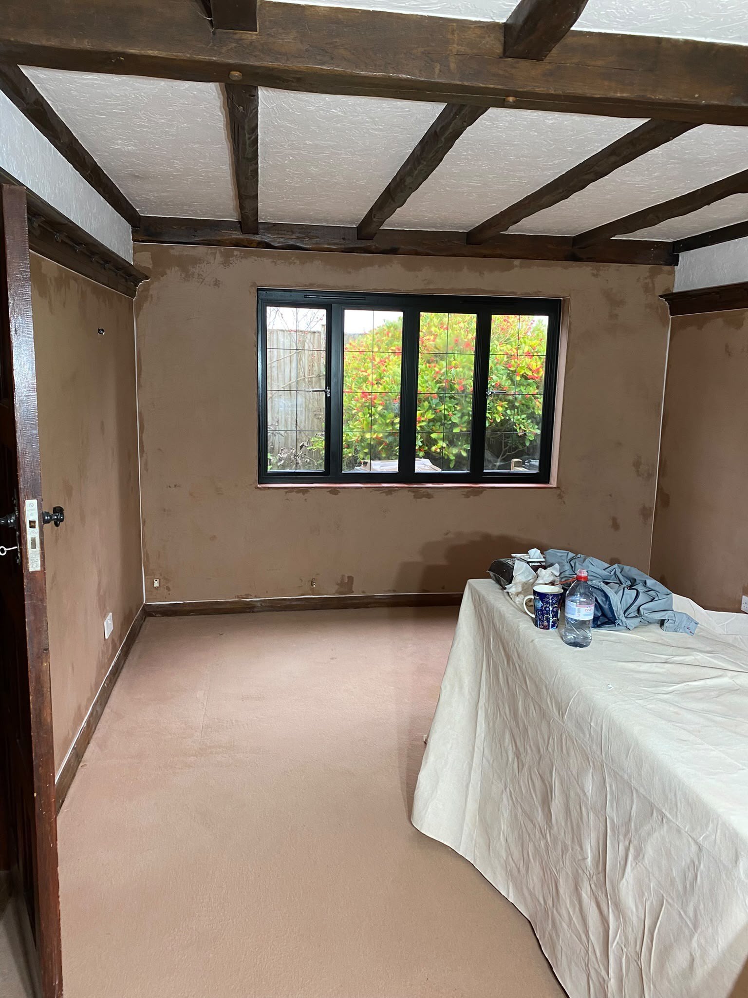 Beamed room walls skimmed, after