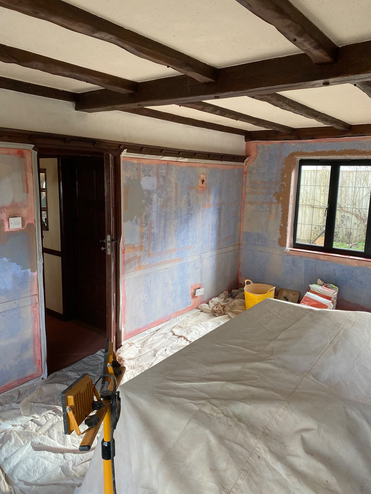 Beamed room mid strip out, during