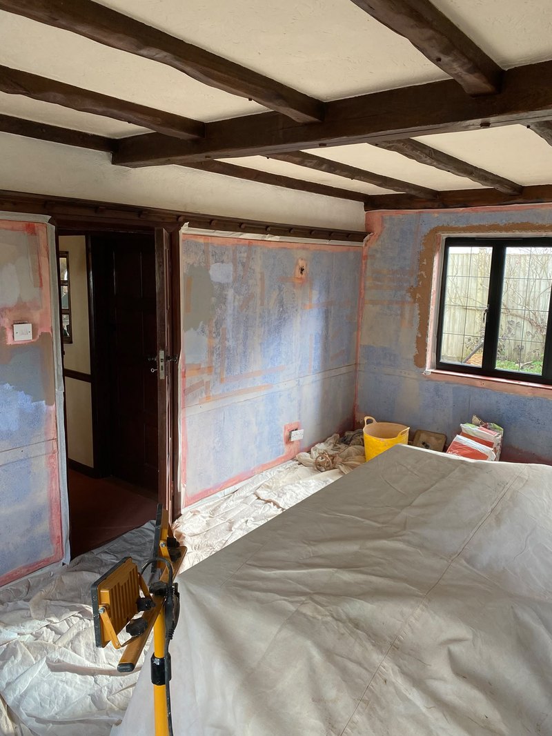 Beamed room mid strip out, during