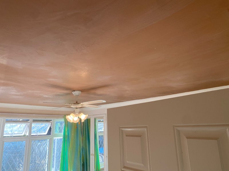 Ceiling skimmed around the fan, after