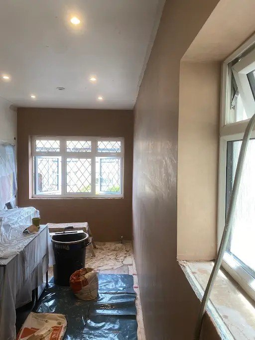 Bathroom walls skimmed floor protected, during
