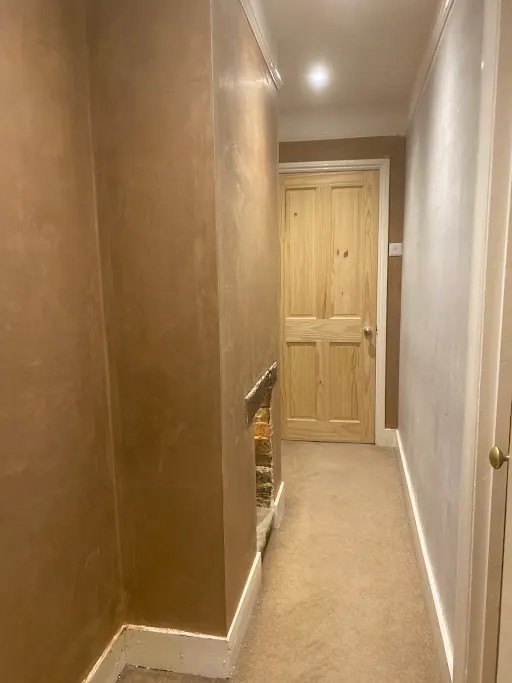 Landing walls skimmed to the door, after