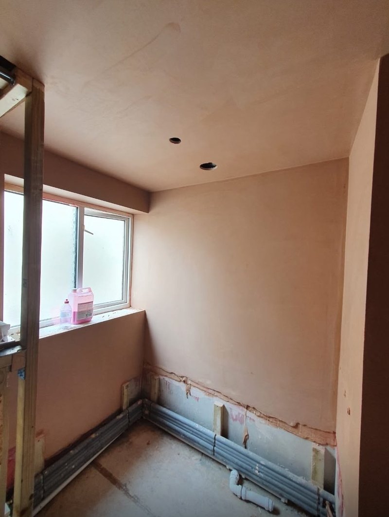 Small room walls and ceiling skimmed to the window, during