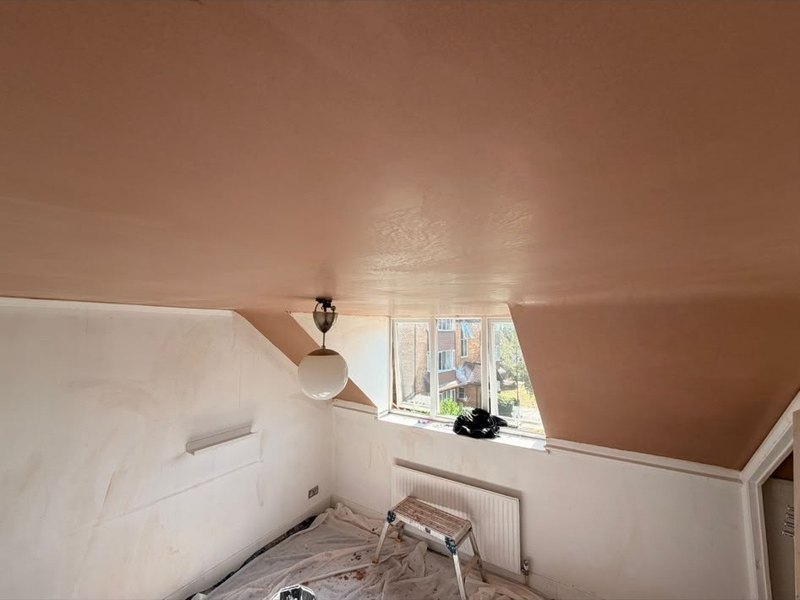 Loft room walls and ceiling skimmed, after