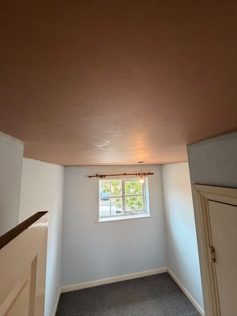Landing ceiling skimmed above the stairs, after