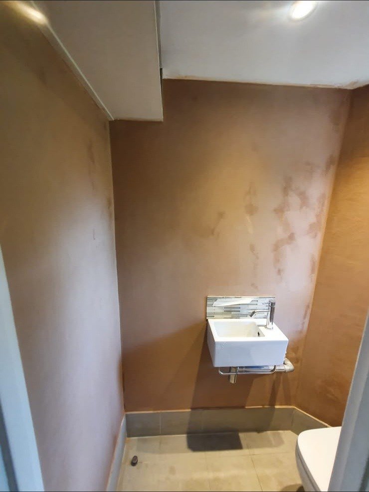 Cloakroom walls and ceiling skimmed, after