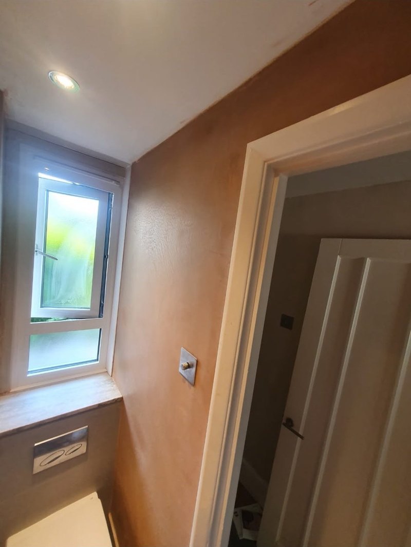 Utility room walls skimmed, after