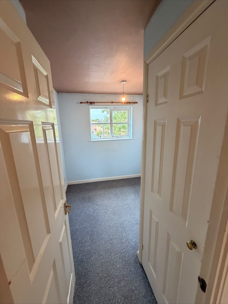 Landing ceiling skimmed between the doors, after