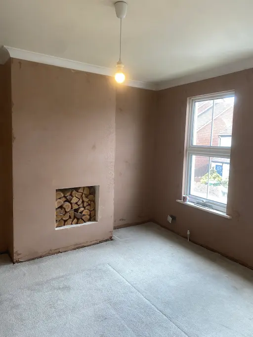Bedroom chimney breast skimmed log store