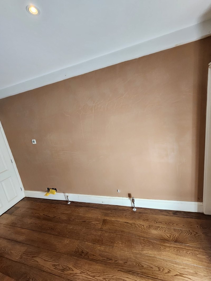 Living room wall skimmed, after