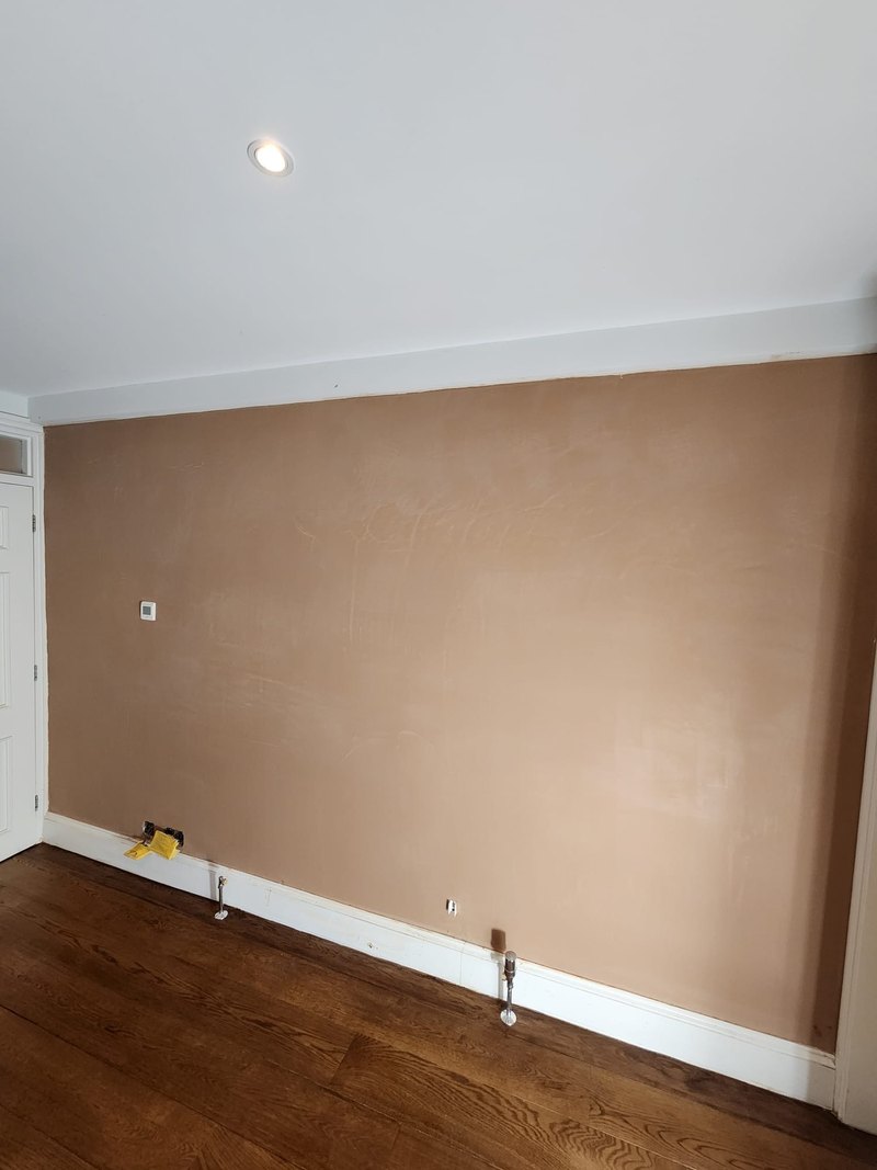 Living room wall skimmed angle, after