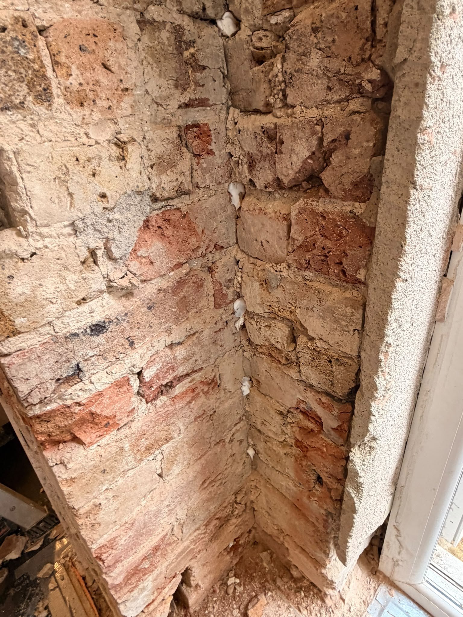 Damp corner DPC injected, during