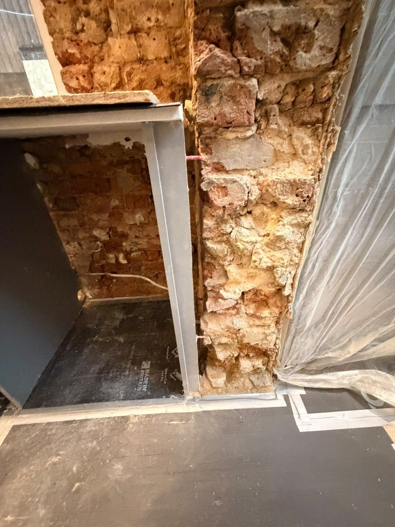 Kitchen pier stripped, before