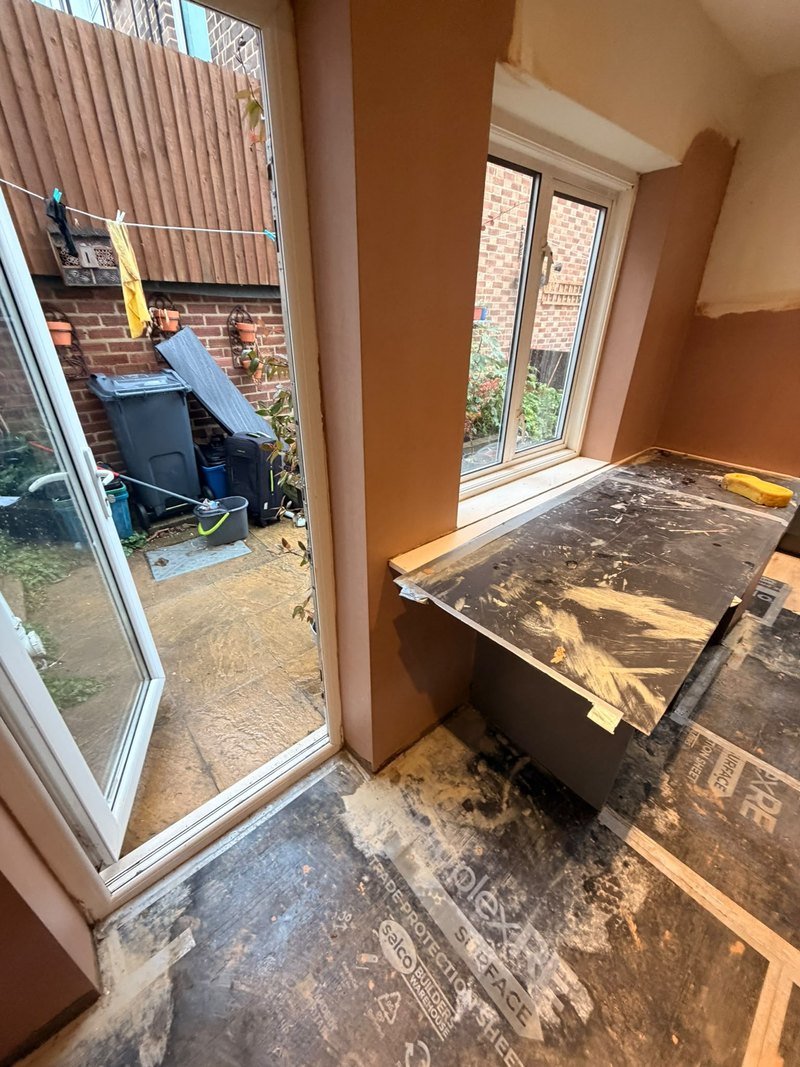 Back door and window wall skimmed, after