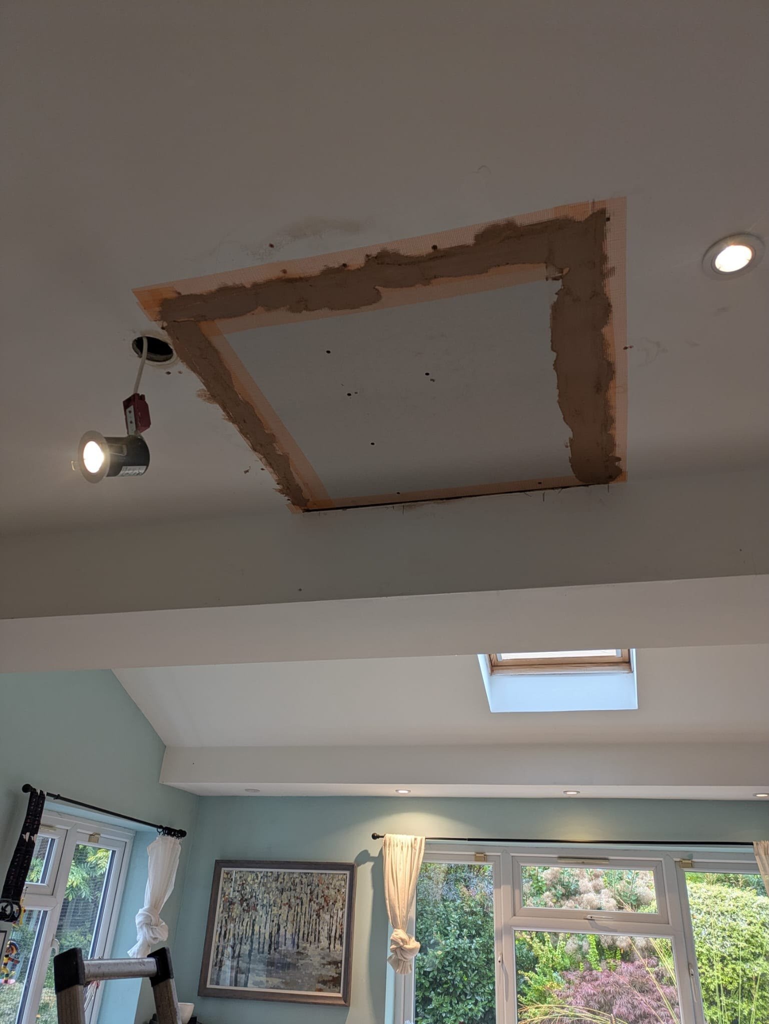 Kitchen ceiling patch boarded and scrimmed, during