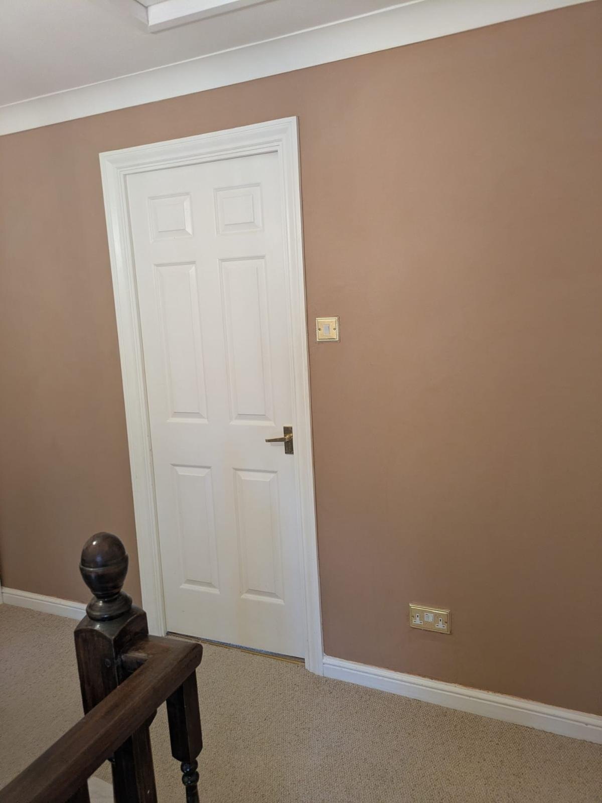 Landing wall skimmed and painted, after