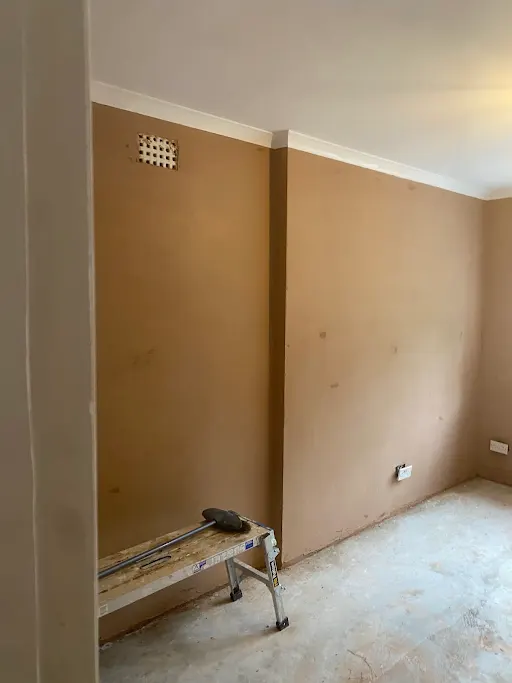 Alcove and chimney breast skimmed air brick