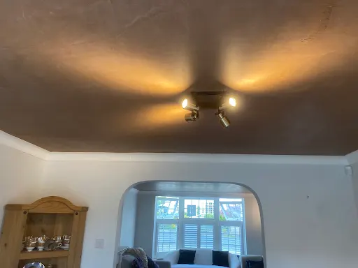 Lounge ceiling skimmed spotlights finished