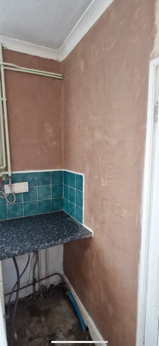 Kitchen wall skimmed finished, after
