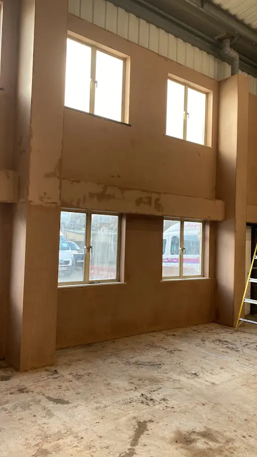 Commercial unit mezzanine walls skimmed