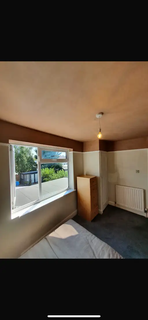 Bedroom ceiling and upper walls skimmed, after