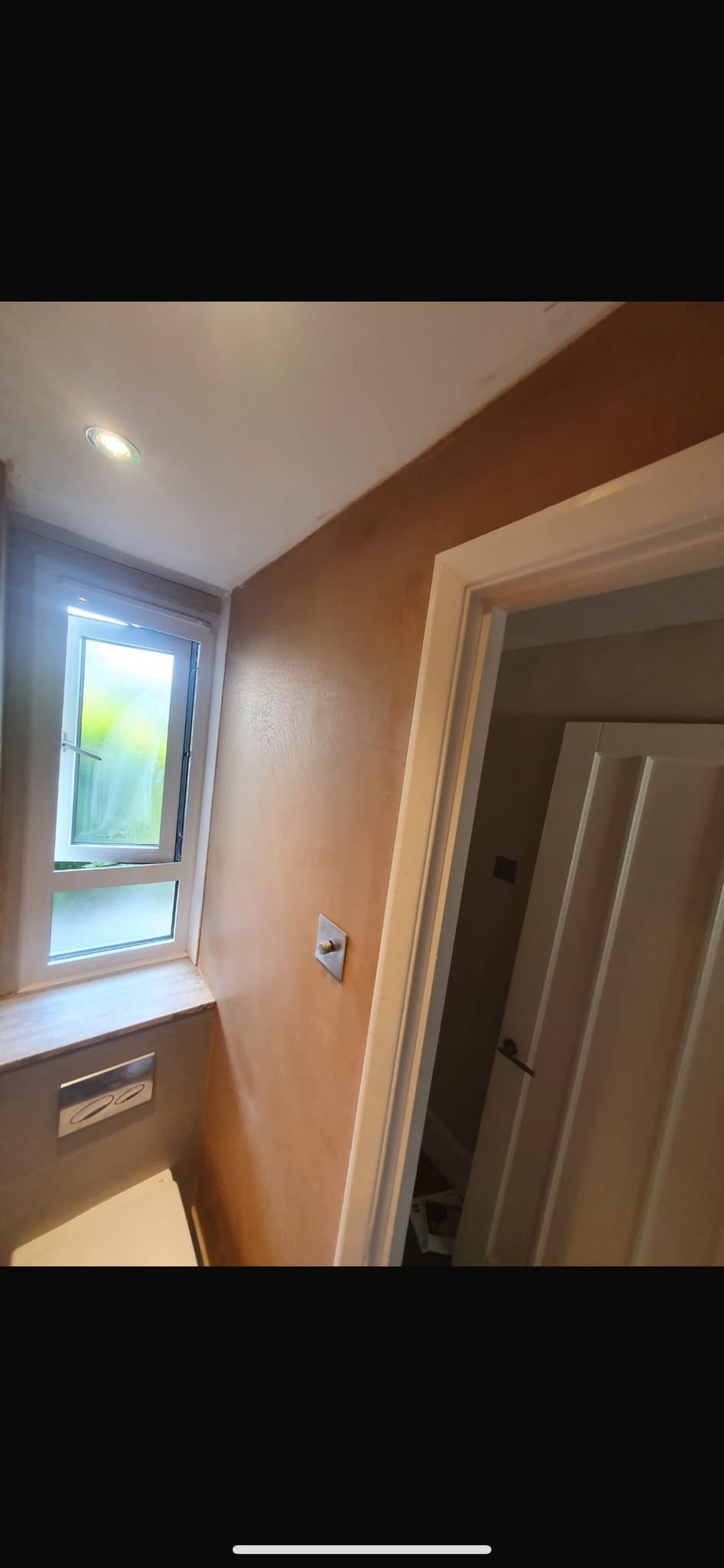 Landing and door reveal skimmed under velux, after