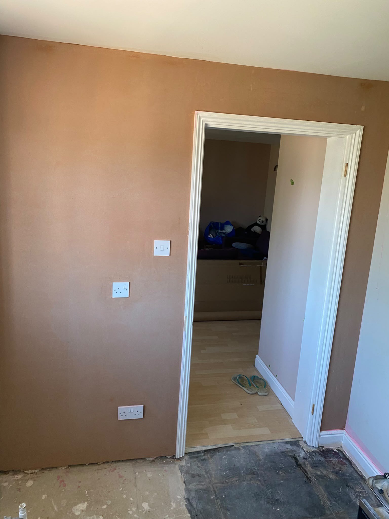 Room skimmed around doorway and sockets, after