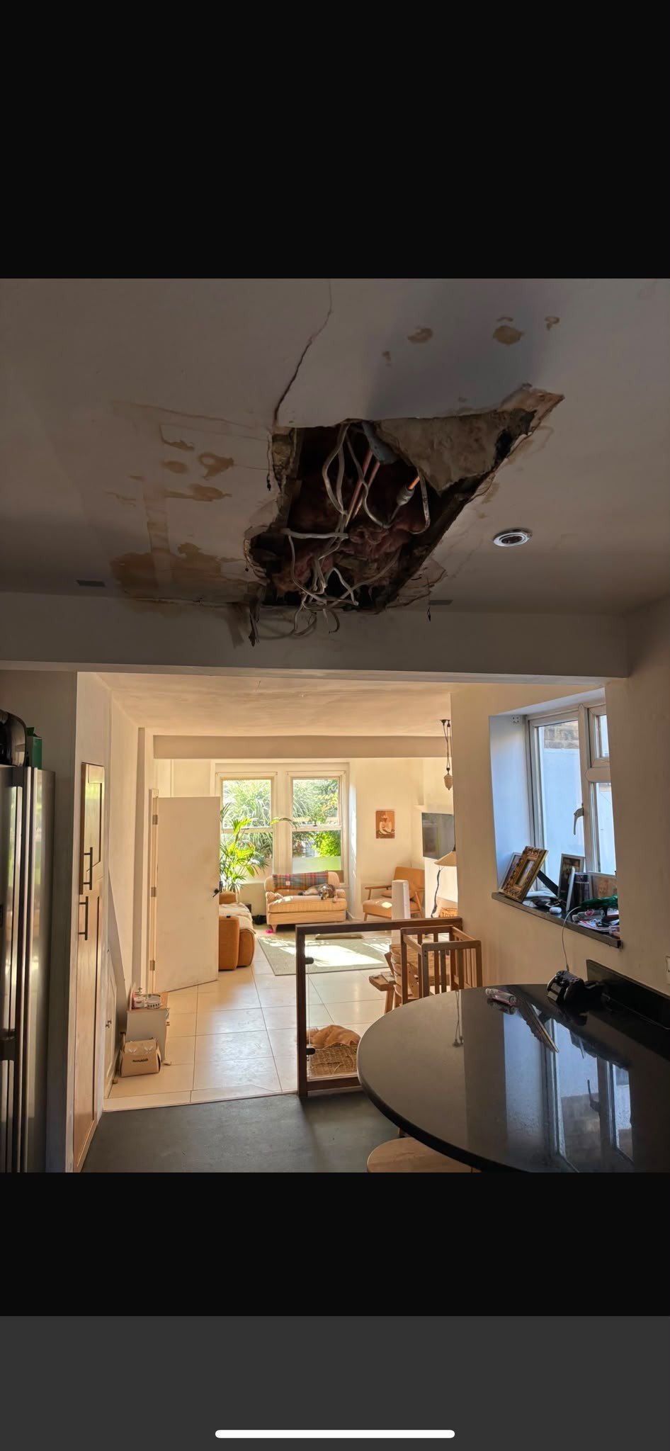 Ceiling collapsed laths exposed, before